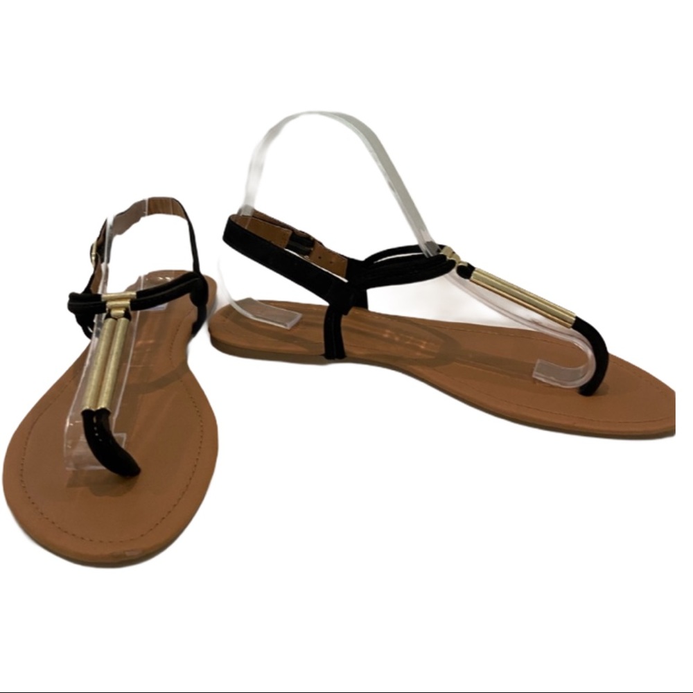 Black & goldtone Cleopatra thong sandals. Sz 9